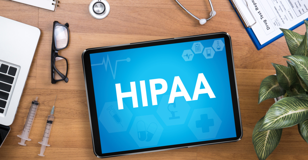 HIPPA text on the screen of a tablet next to stethoscope 