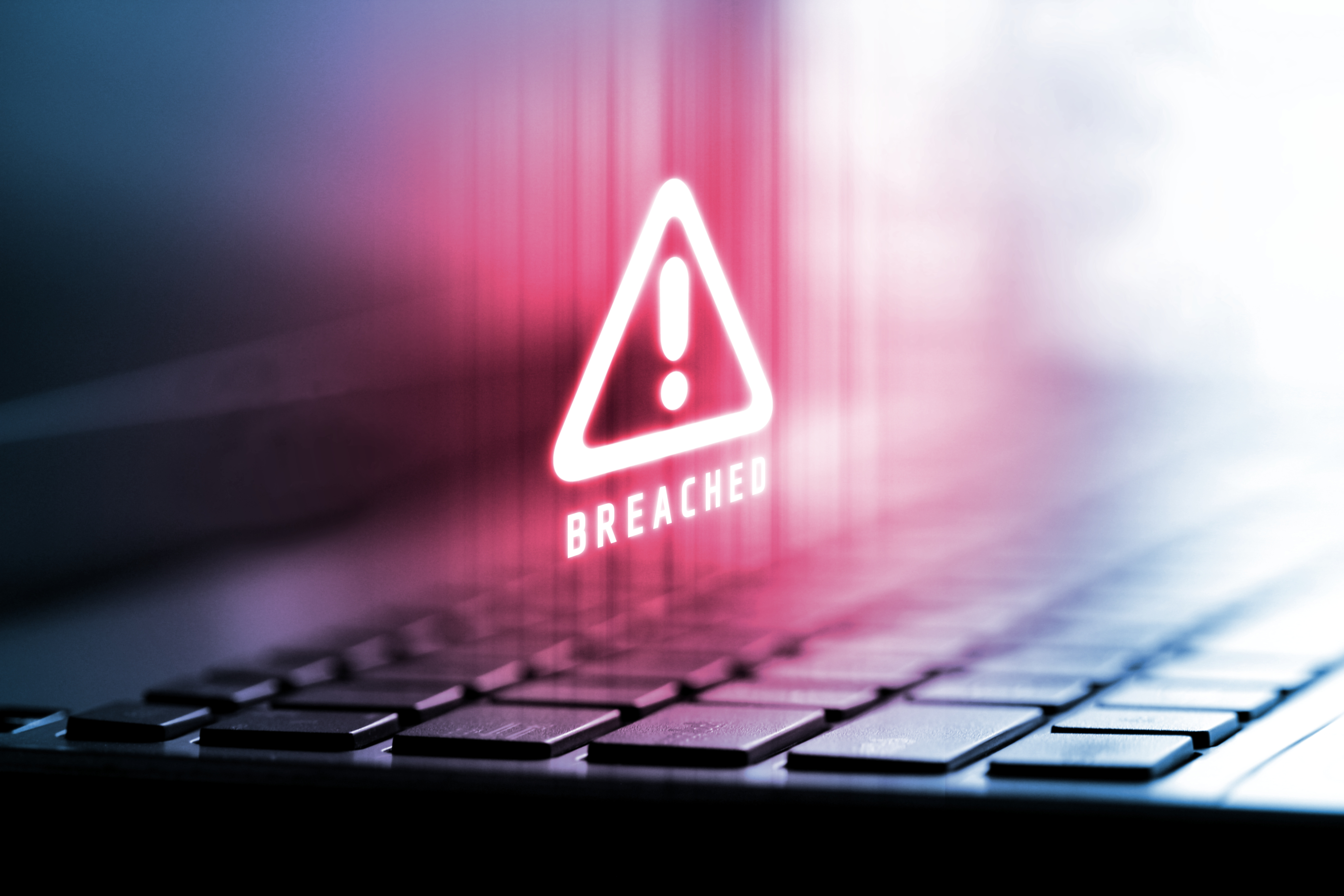 A futuristic image with the word breached written in the middle representing a data breach for accounting firms.