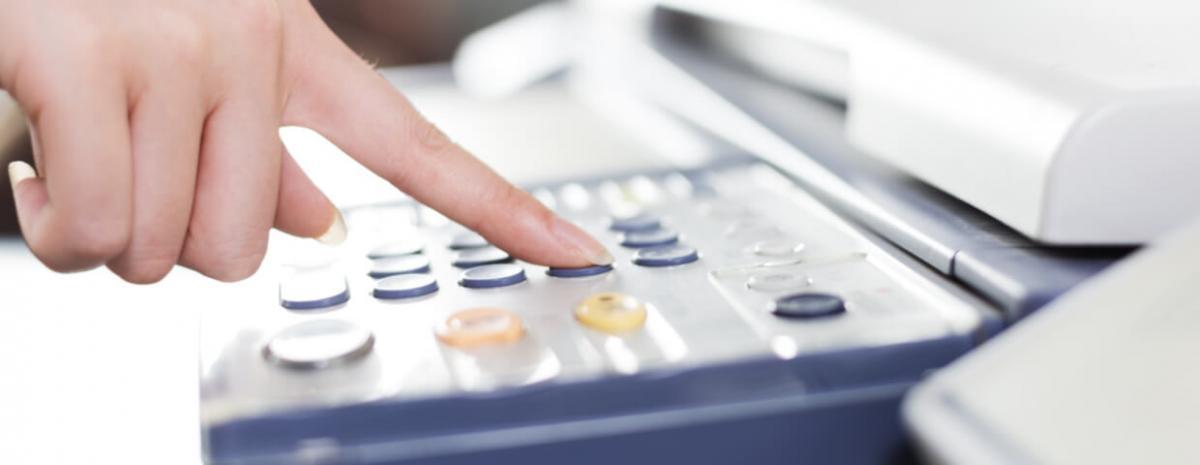 person operating an mfp; close up shot